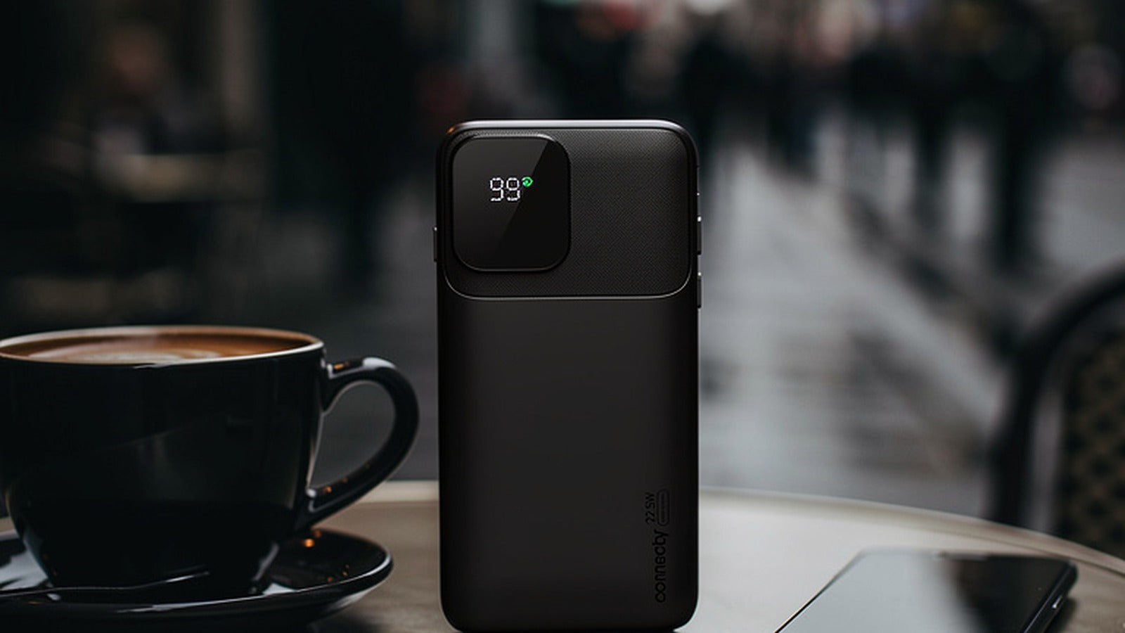 Connecty GO power bank at a café